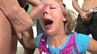 Trashy blonde whore is exploited in hardcore blowbang porn video